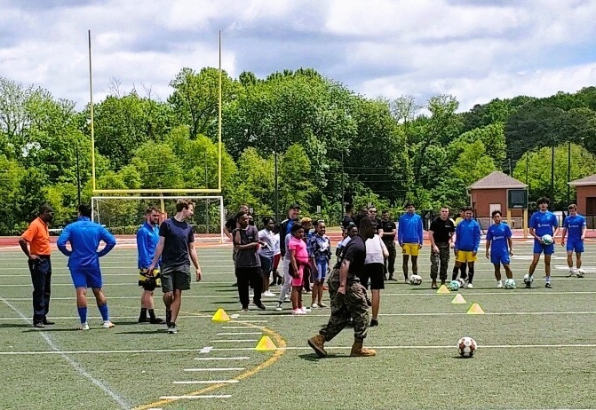 FC Birmingham Players Lead Children In Soccer Drills At The BCS Let's Move Community Huddle.